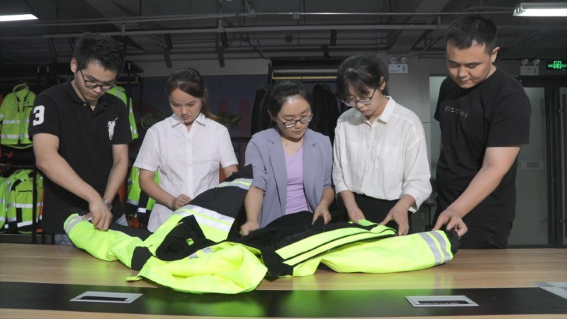 BOWINS team reviews reflective placement on safety jackets
