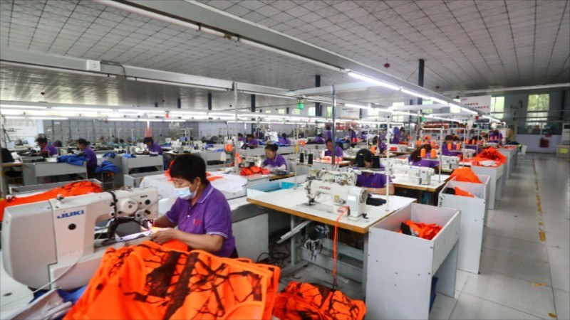 BOWINS sewing operations for orange protective workwear